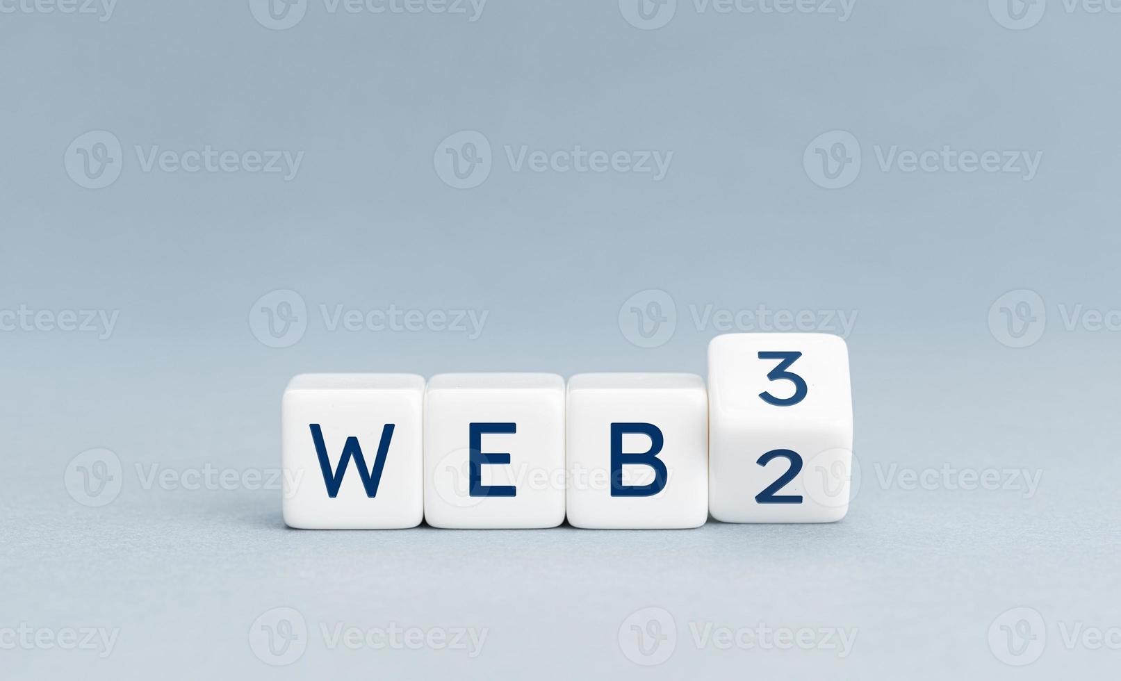 From web 2.0 to web 3.0 concept. Wooden blocks with text on gray background. Copy space photo