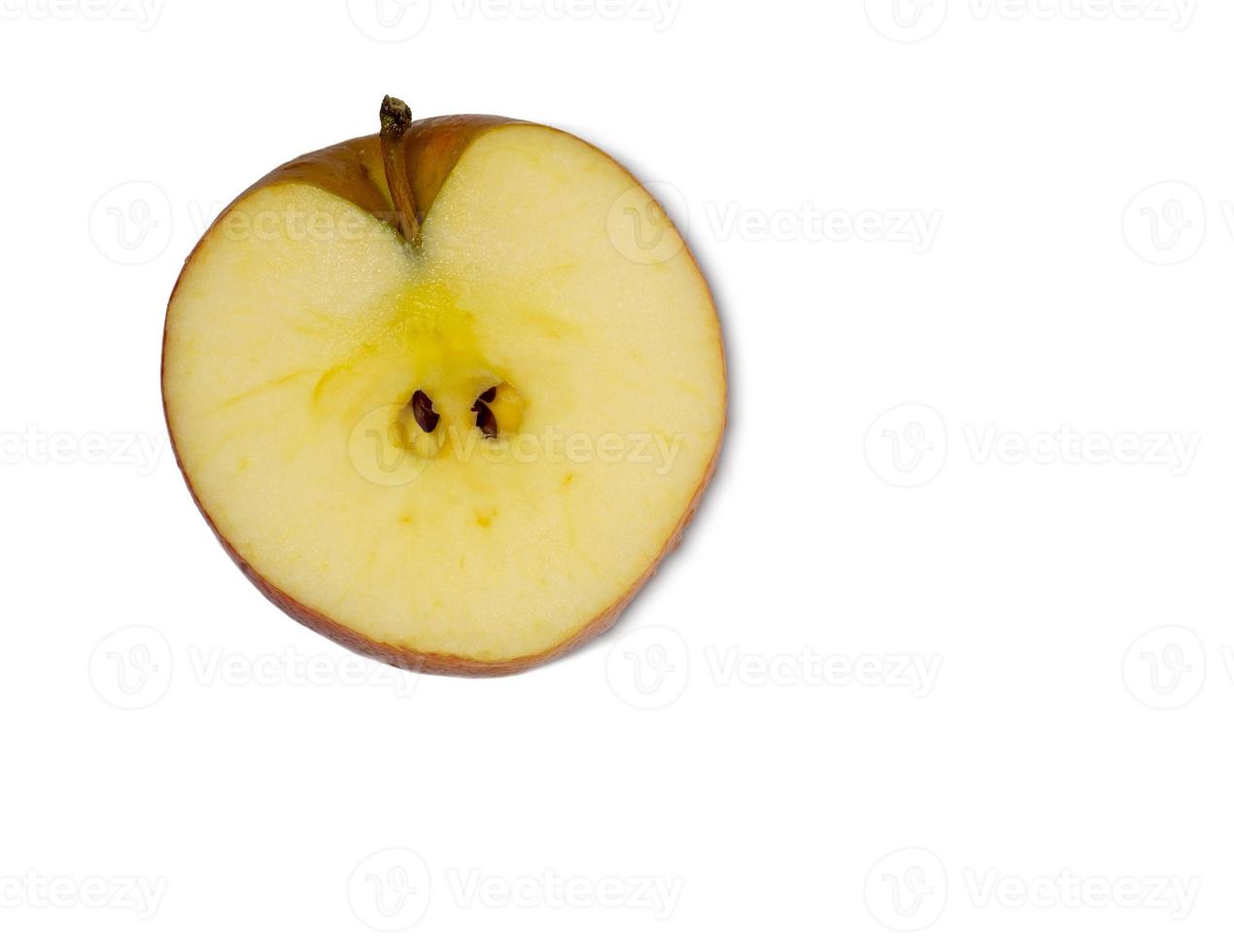 Cut off half of a red apple. Fresh fruit isolate. photo