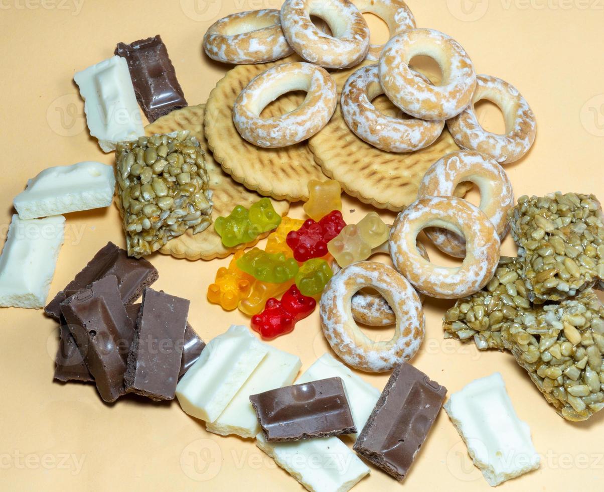 Background from different sweets. Sweets and flour products  on the table. photo