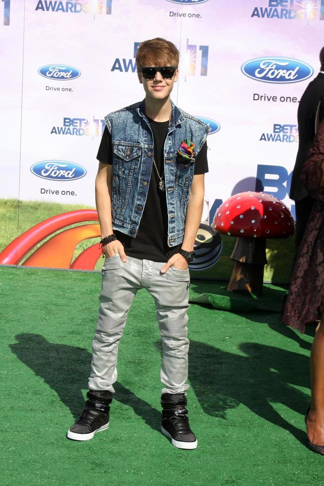LOS ANGELES - JUN 26 - Justin Bieber arriving at the 11th Annual BET Awards at Shrine Auditorium on June 26, 2004 in Los Angeles, CA photo