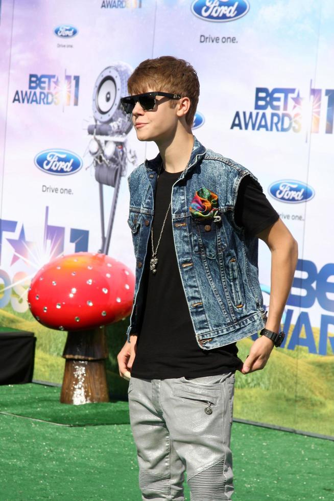 LOS ANGELES - JUN 26 - Justin Bieber arriving at the 11th Annual BET Awards at Shrine Auditorium on June 26, 2004 in Los Angeles, CA photo