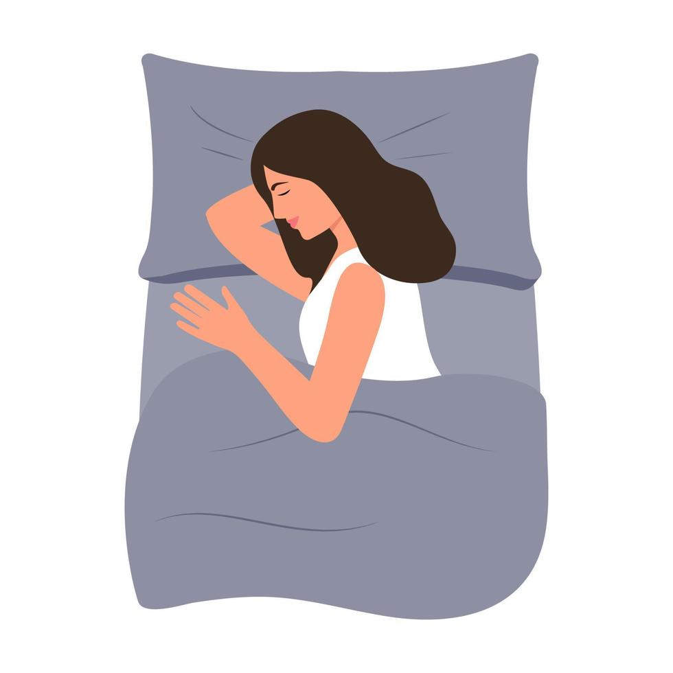 Young woman sleeping.Top view. Girl in pajama in cozy bed. Sleeping