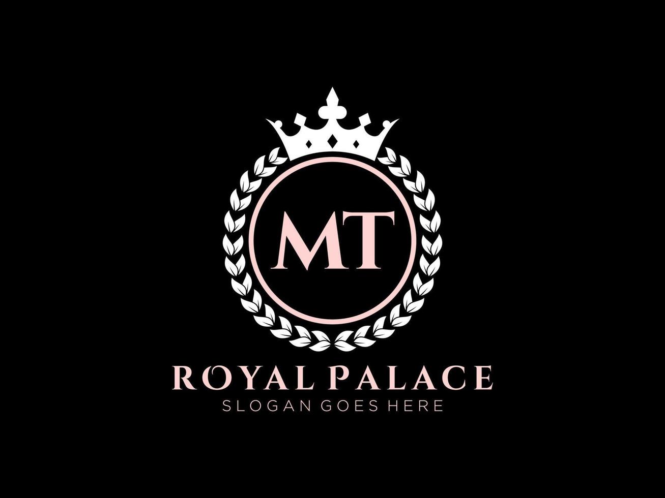 Letter MT Antique royal luxury victorian logo with ornamental frame. vector