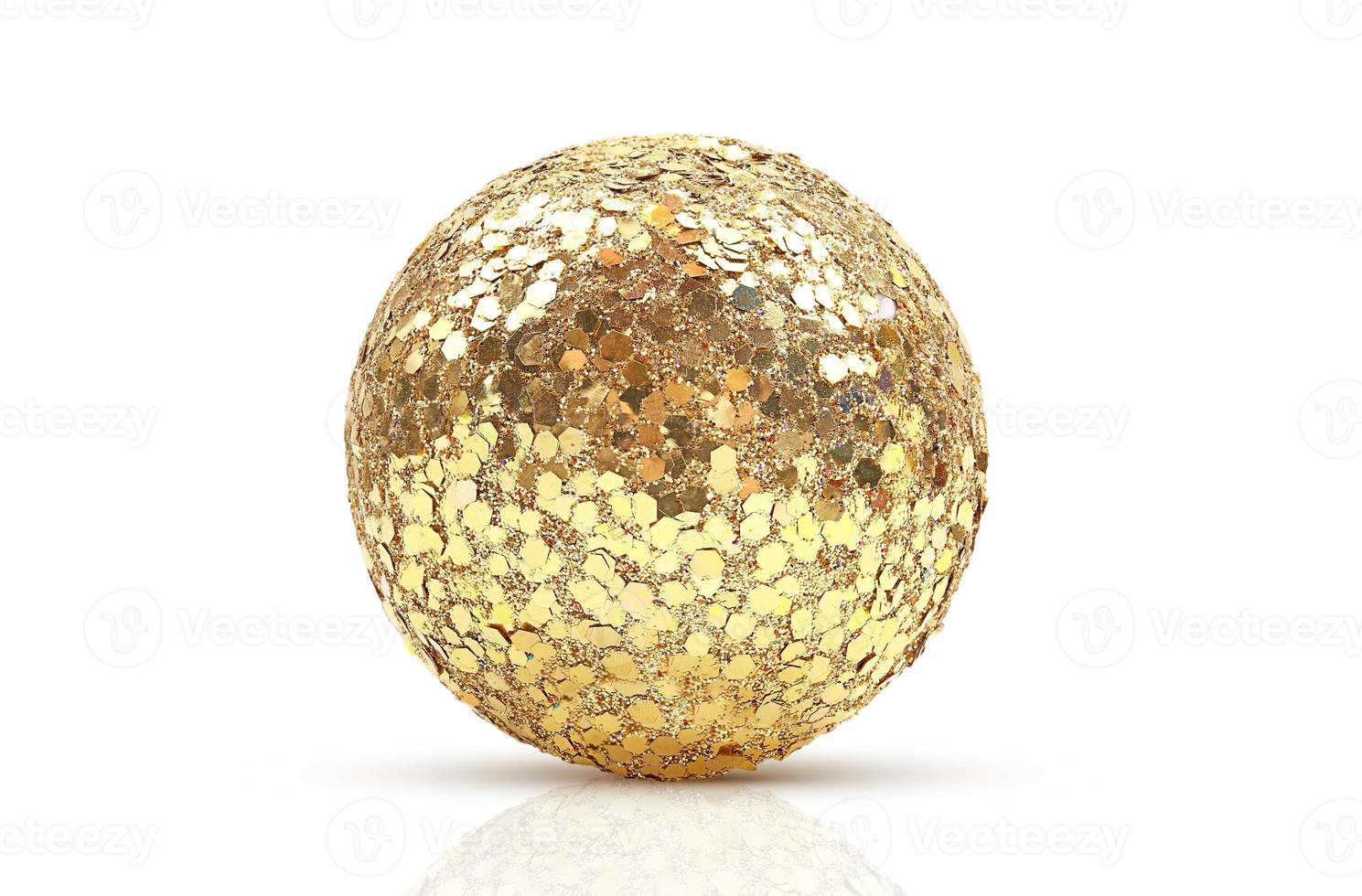 Gold festive shiny ball with large sparkles on white isolated background. Design element. Disco, Party, Christmas, New Year photo