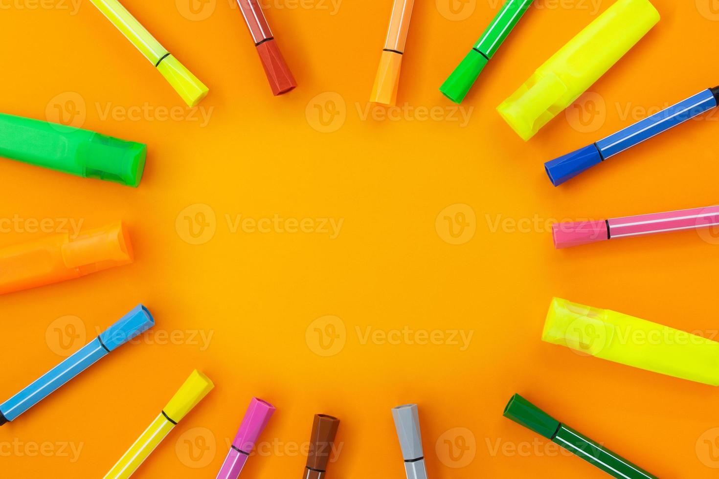 Felt tip pens and markers lie around. Frame from office supplies. Concept Back to school , drawing. Copy space photo