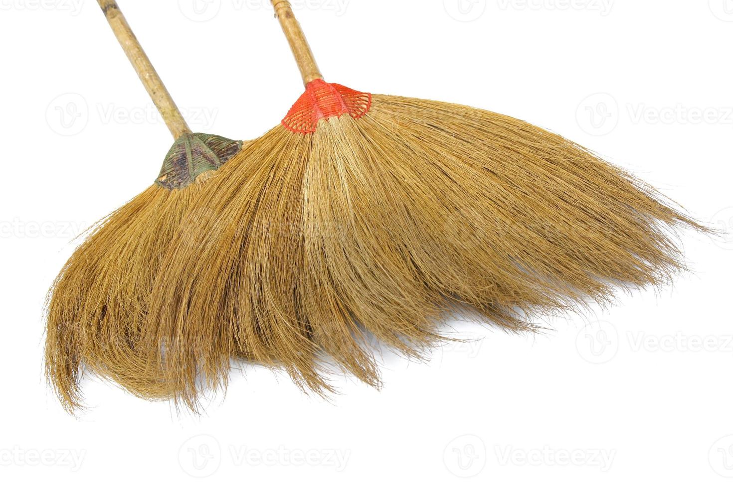 Broom isolated on white background photo