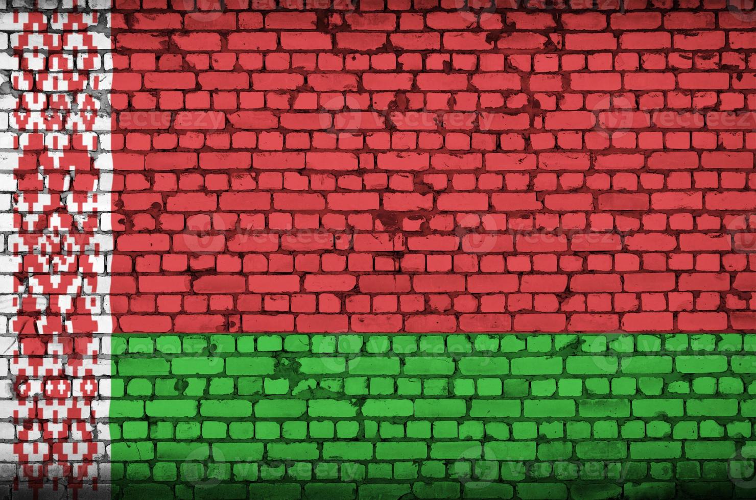 Belarus flag is painted onto an old brick wall photo