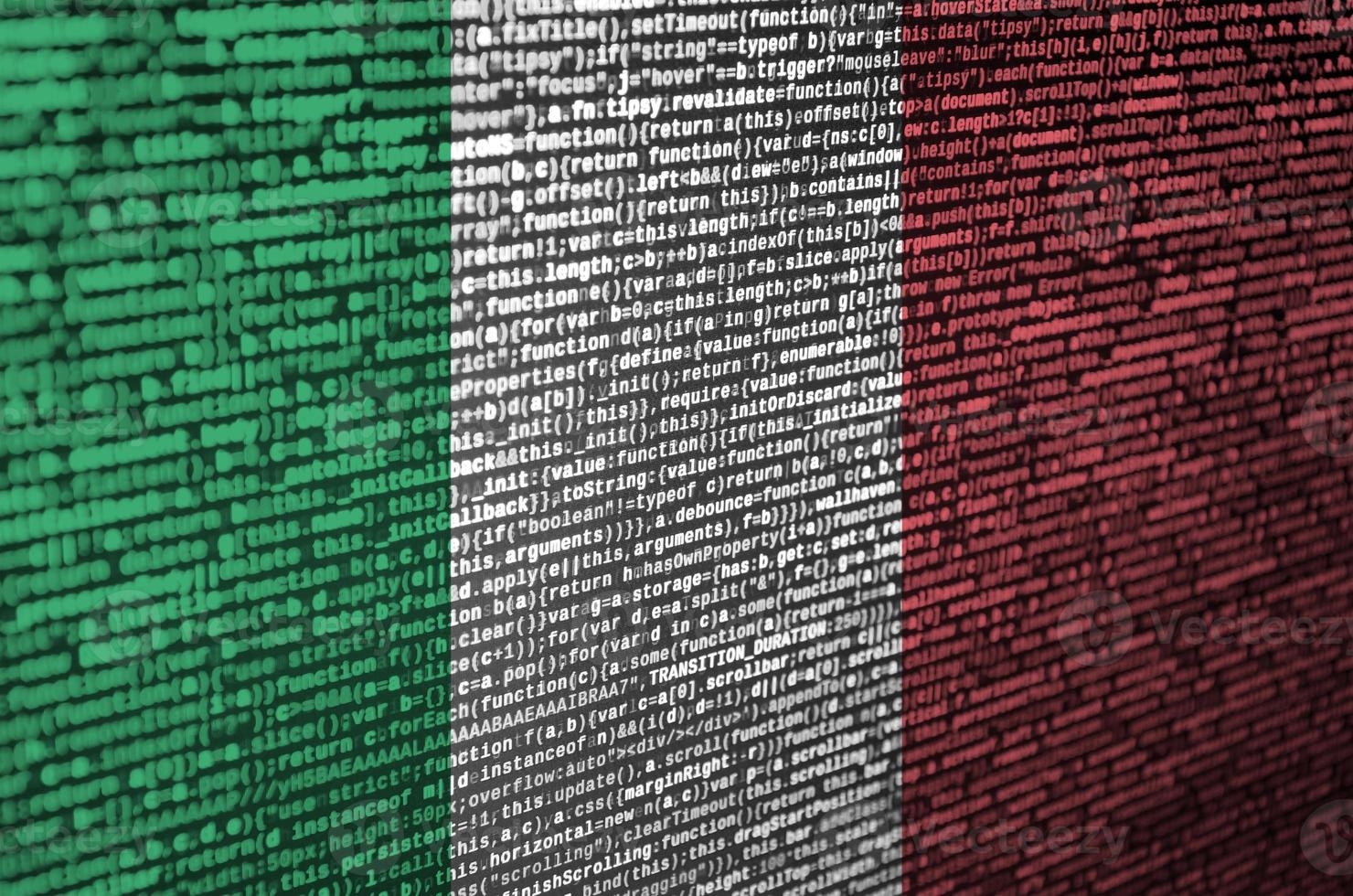 Italy flag  is depicted on the screen with the program code. The concept of modern technology and site development photo