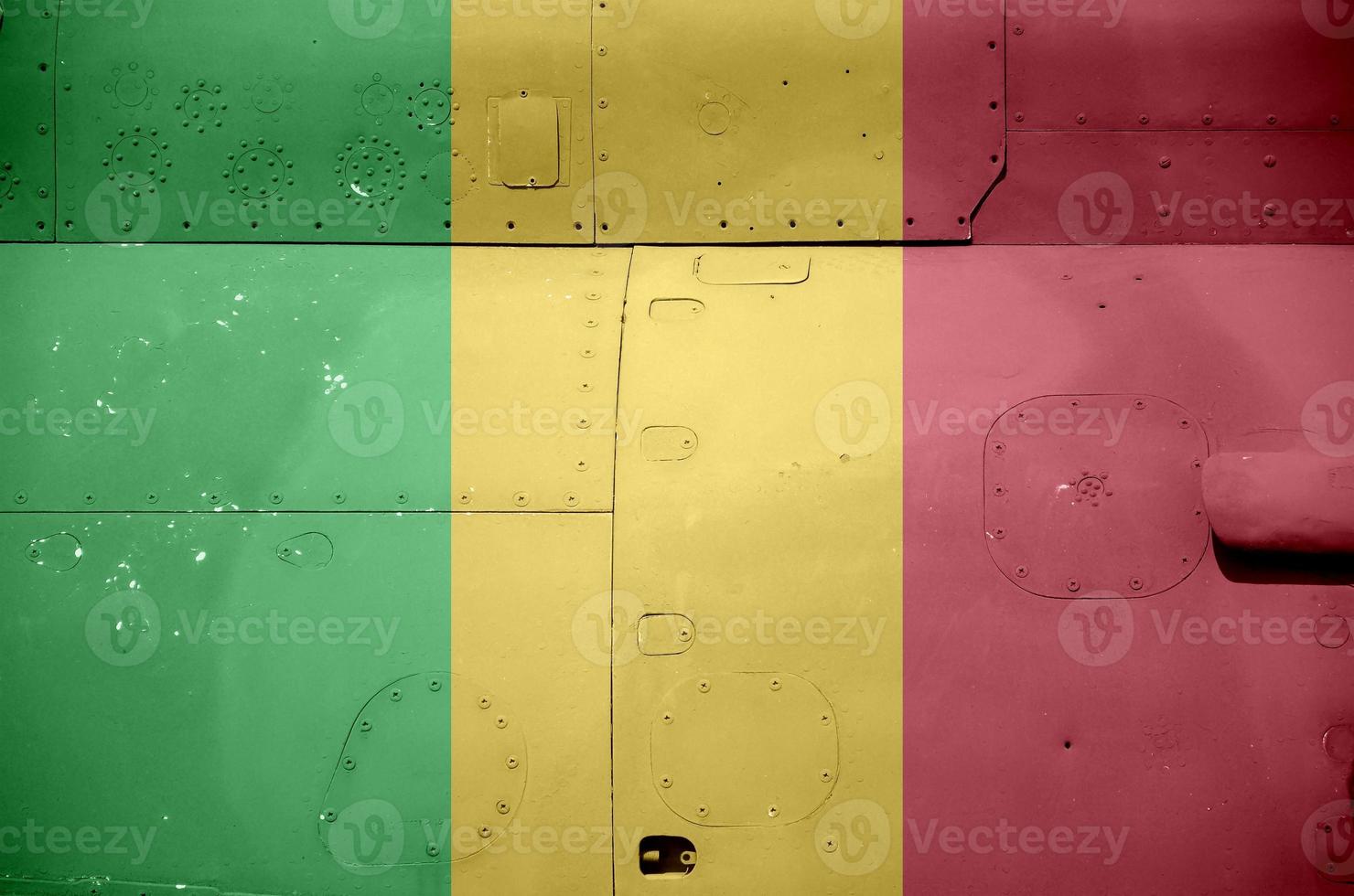Mali flag depicted on side part of military armored helicopter closeup. Army forces aircraft conceptual background photo
