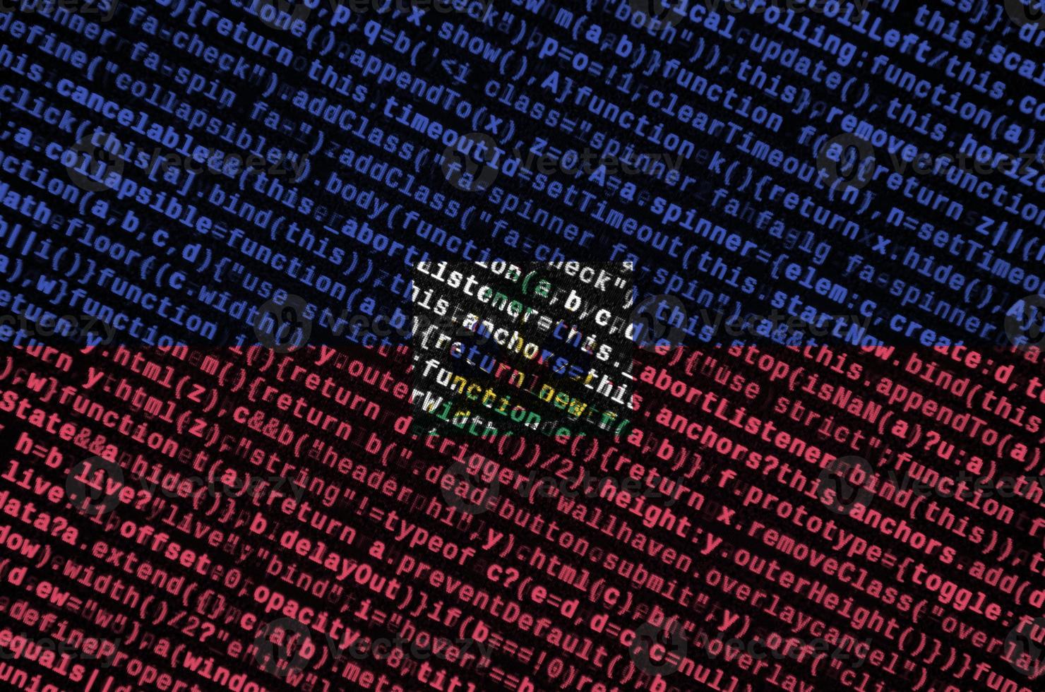 Haiti flag  is depicted on the screen with the program code. The concept of modern technology and site development photo