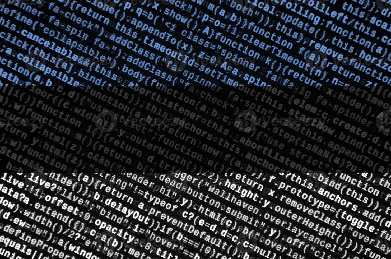 Estonia flag  is depicted on the screen with the program code. The concept of modern technology and site development photo