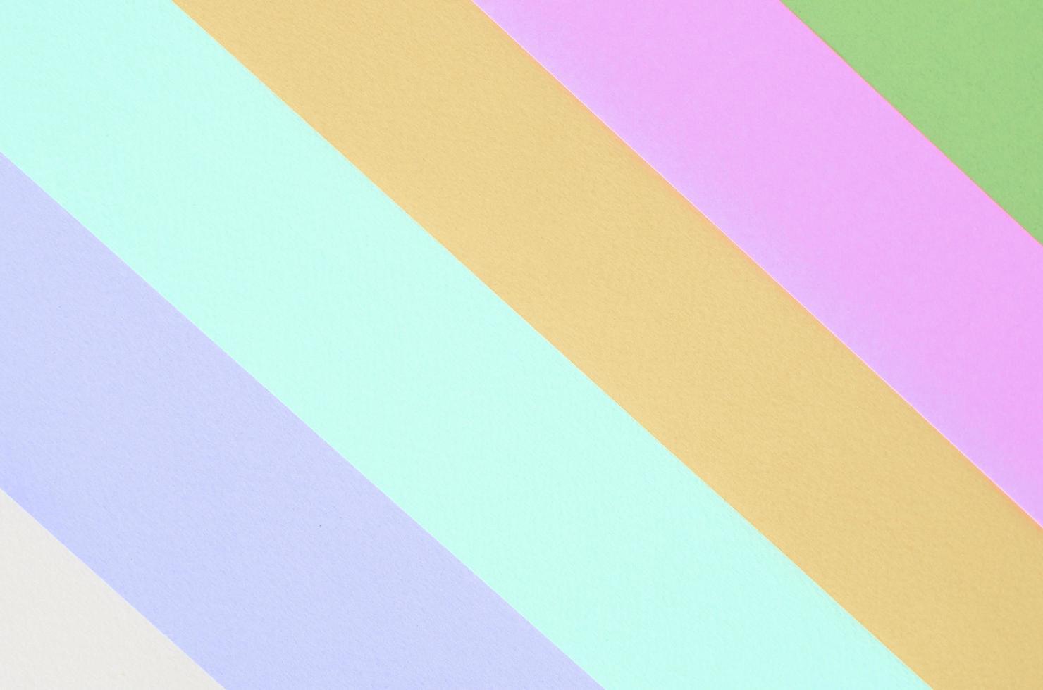 Texture background of fashion pastel colors. Pink, violet, orange, green, beige and blue geometric pattern papers photo