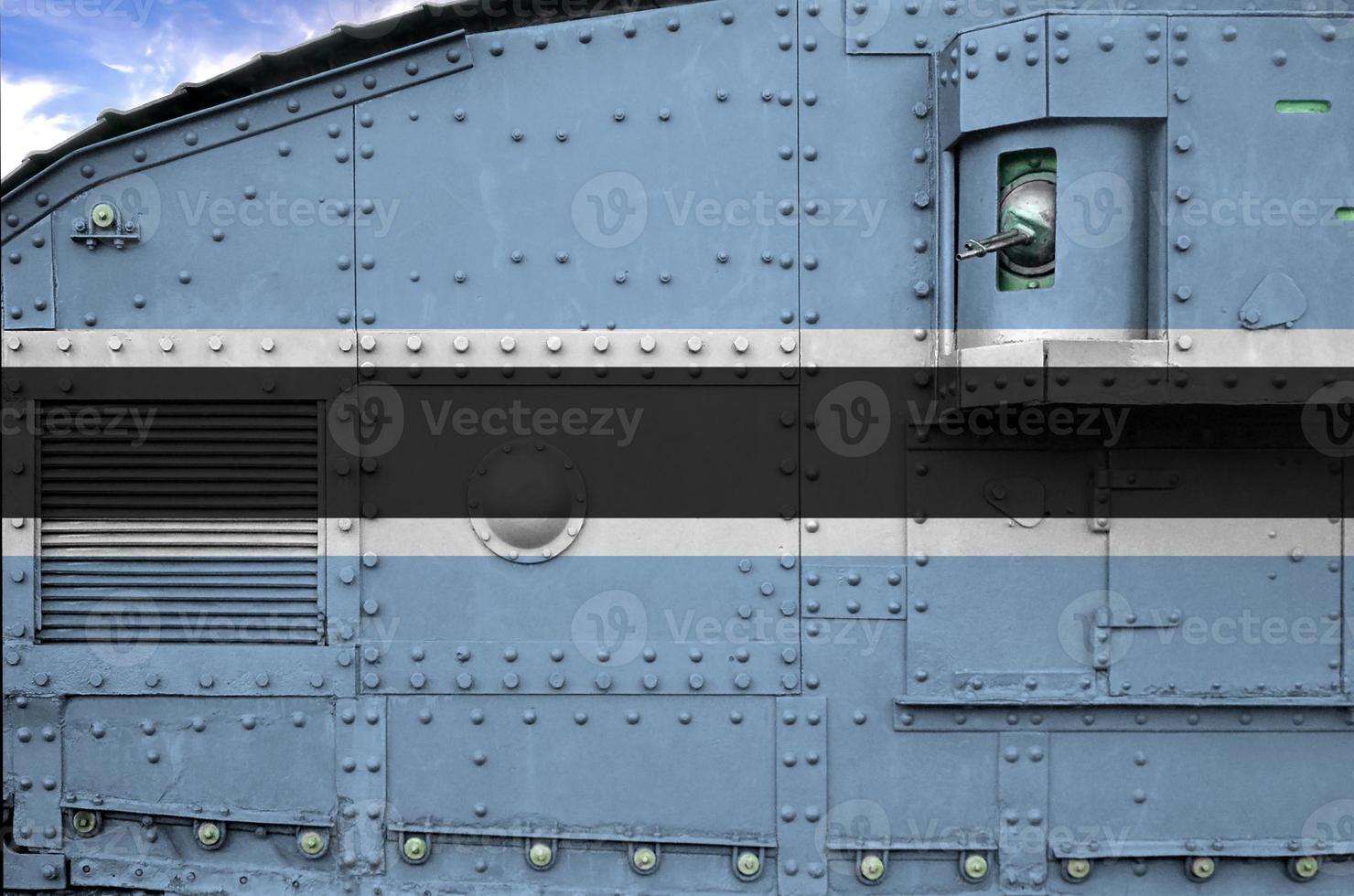 Botswana flag depicted on side part of military armored tank closeup. Army forces conceptual background photo