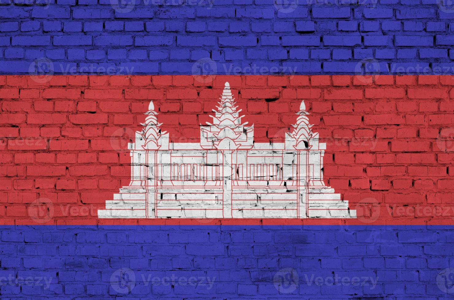 Cambodia flag is painted onto an old brick wall photo