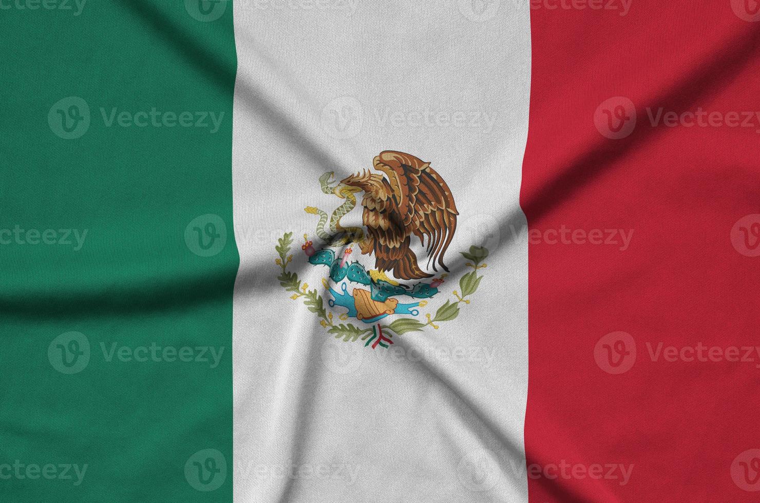 Mexico flag  is depicted on a sports cloth fabric with many folds. Sport team banner photo