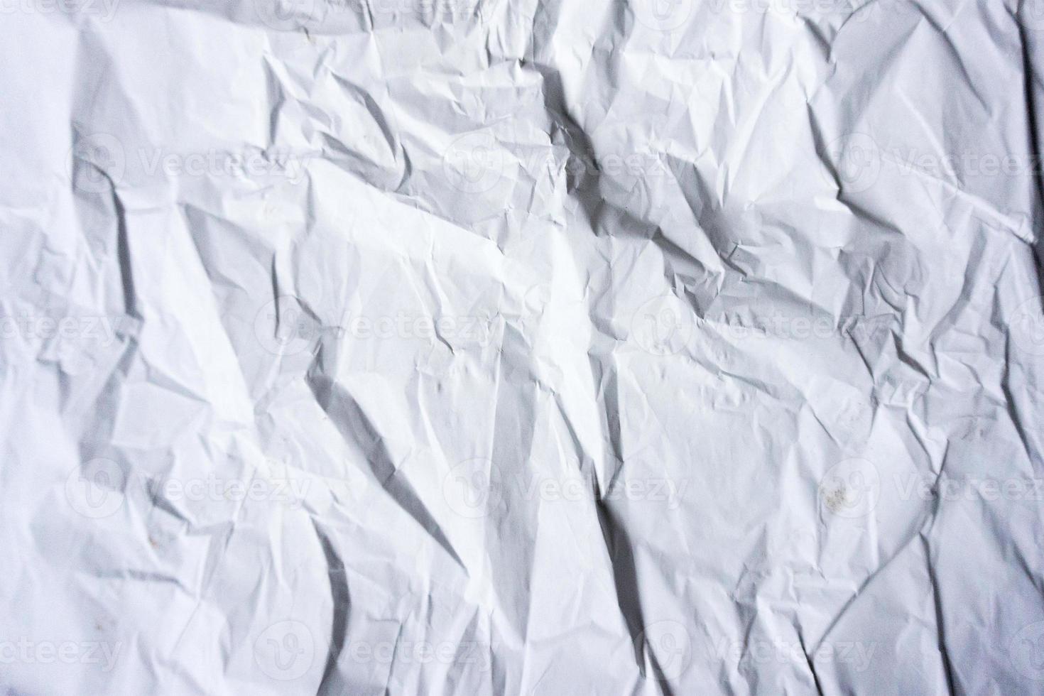 CRUMPLED WHITE PAPER TEXTURE BACKGROUND photo
