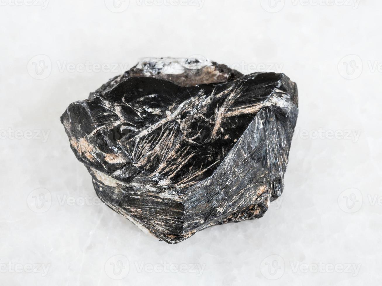 raw Hematite crystal on white photo