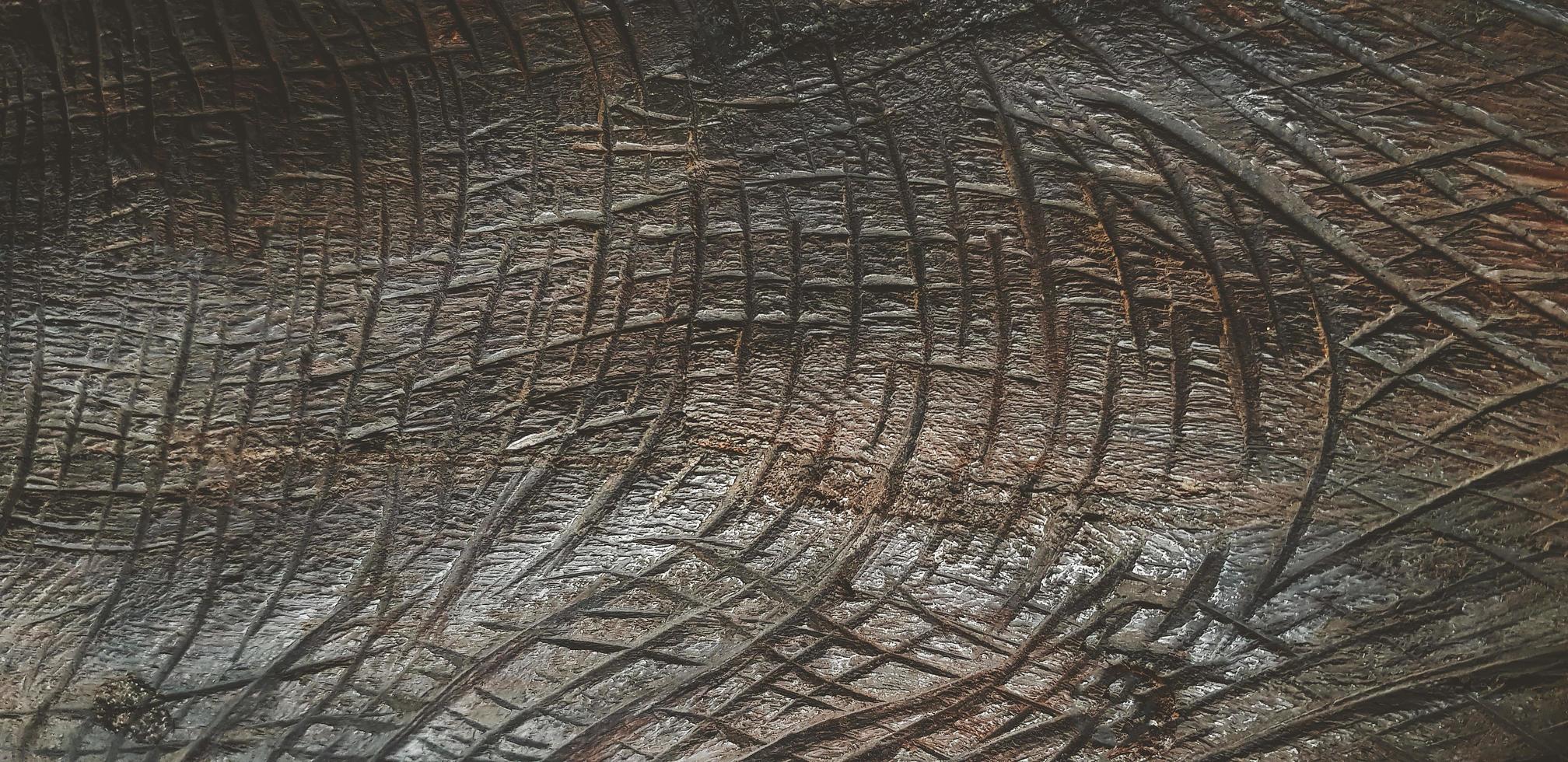 Black scratched wooden background. Line pattern of wood panel wall or in vintage tone. Art of timber wallpaper photo