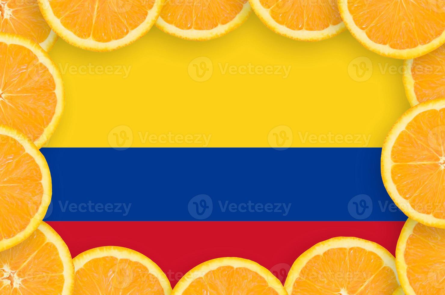 Colombia flag  in fresh citrus fruit slices frame photo