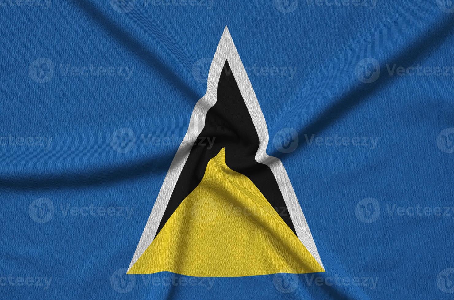 Saint Lucia flag  is depicted on a sports cloth fabric with many folds. Sport team banner photo
