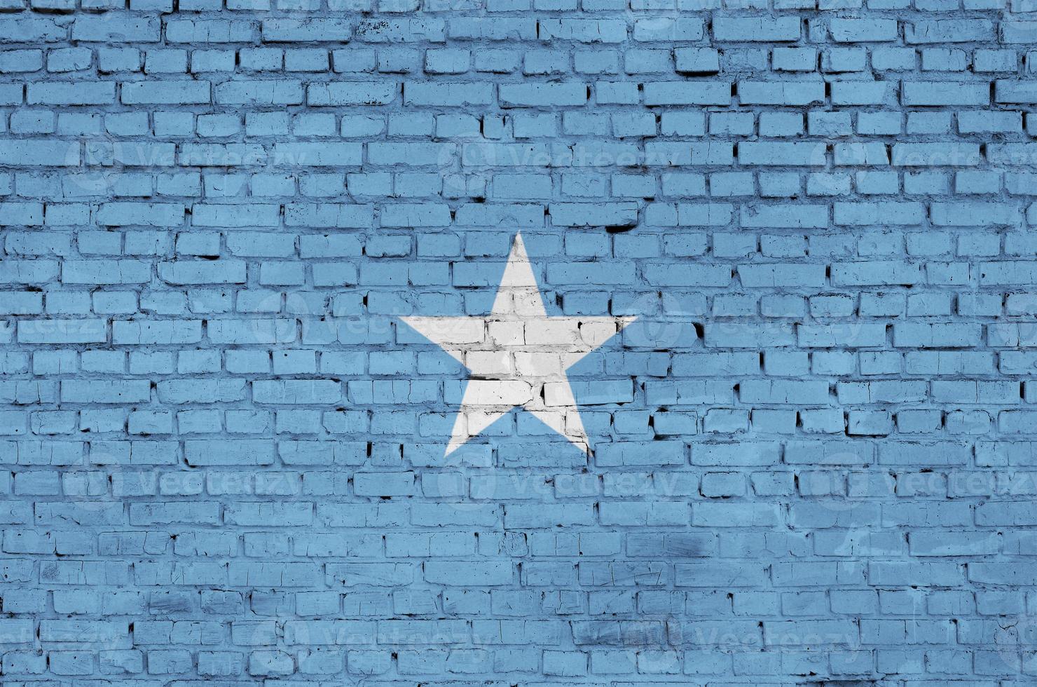 Somalia flag is painted onto an old brick wall photo