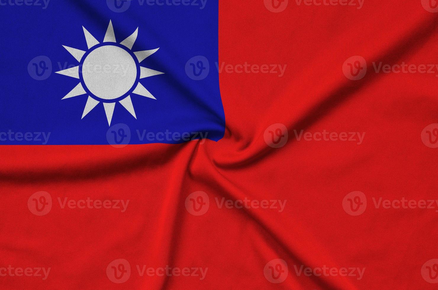 Taiwan flag  is depicted on a sports cloth fabric with many folds. Sport team banner photo