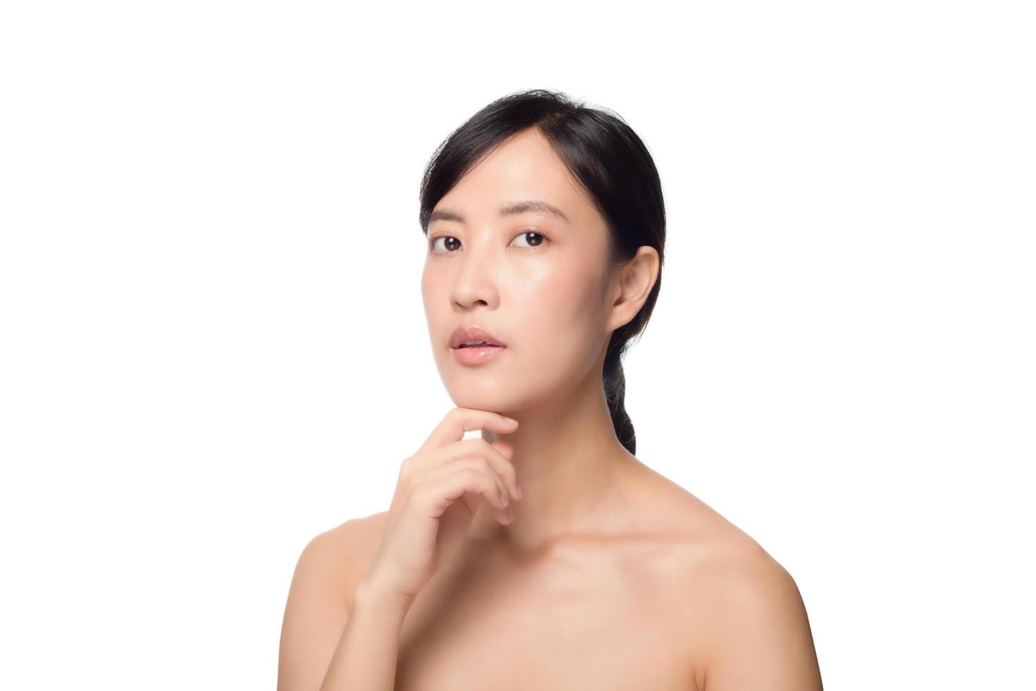 Portrait of beautiful young asian woman clean fresh bare skin concept. Asian girl beauty face skincare and health wellness, Facial treatment, Perfect skin, Natural make up on white background photo