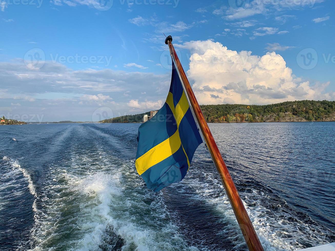 Swedish flag on a sailing boat 4 photo