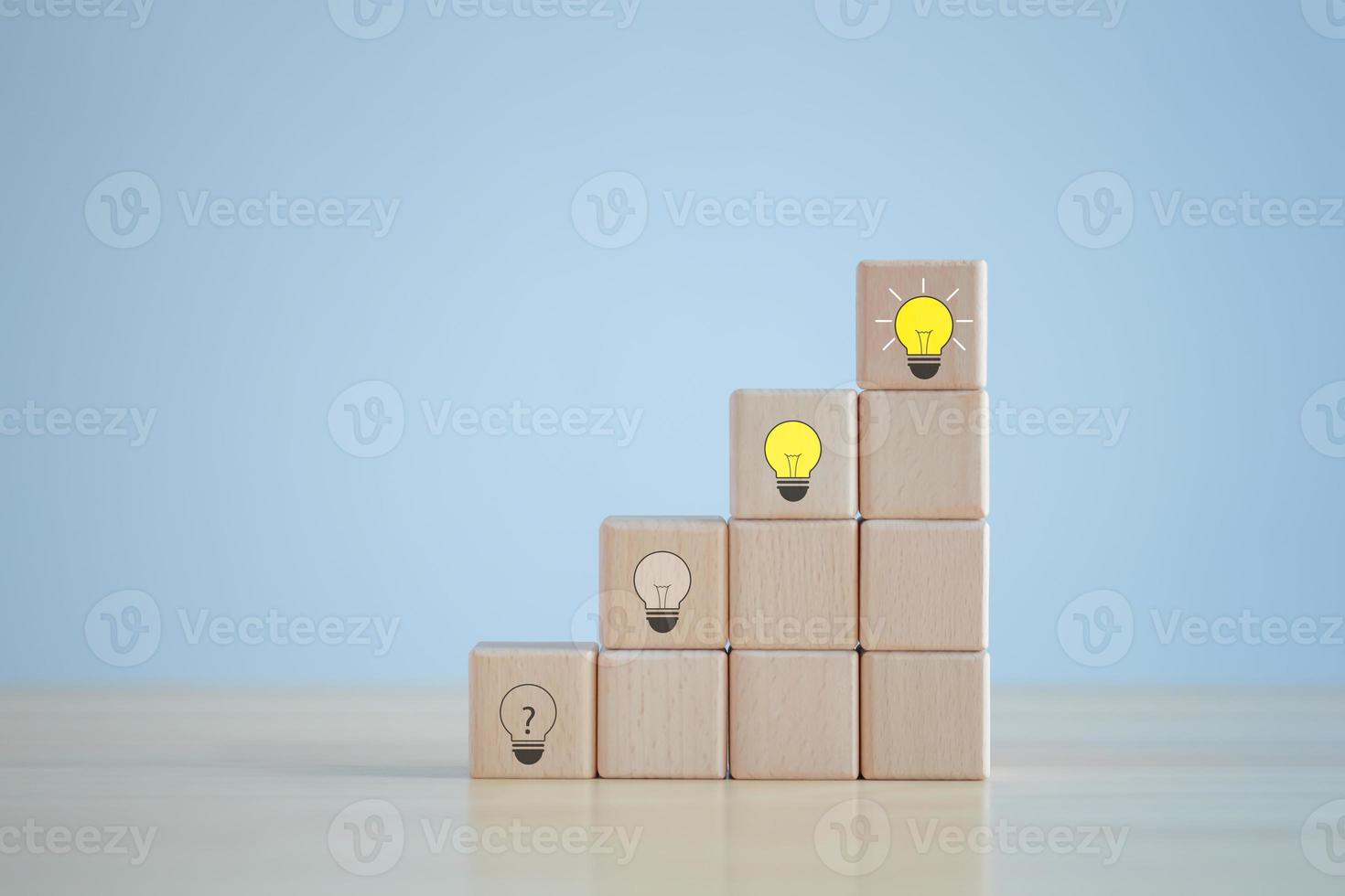 Idea and creativity concept. Creative process concept and problem solution. Question mark step on stair to glowing light bulb for solving problem. photo