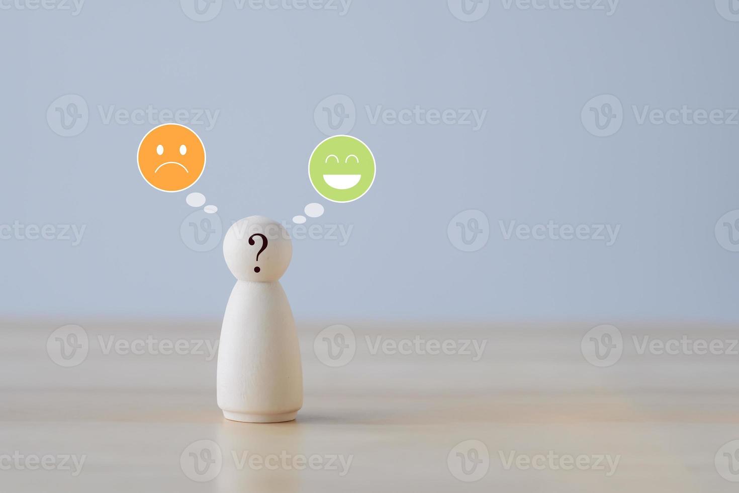 Question mark on face of human figure and speech bubble with happy and unhappy face. Emotion, Feedback, Satisfaction, Customer service review, Mental health assessment, World mental health day. photo