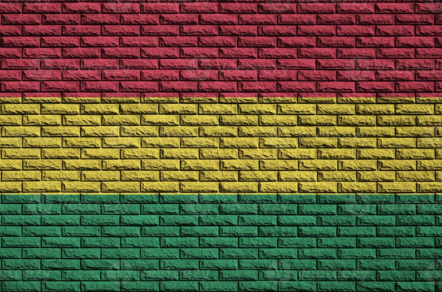 Bolivia flag is painted onto an old brick wall photo