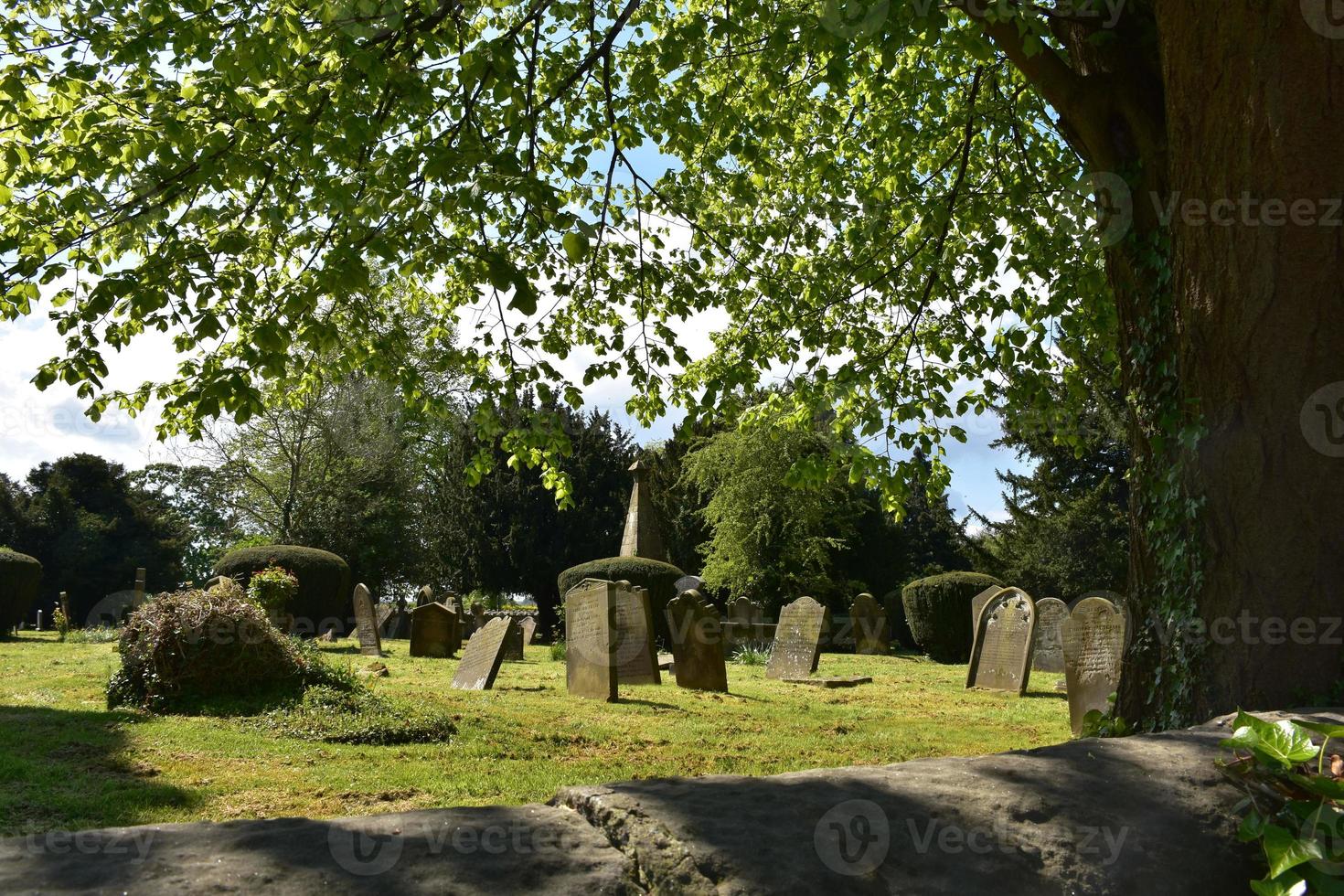 Old Gravestones in a Graveyard in England 13288298 Stock Photo at Vecteezy