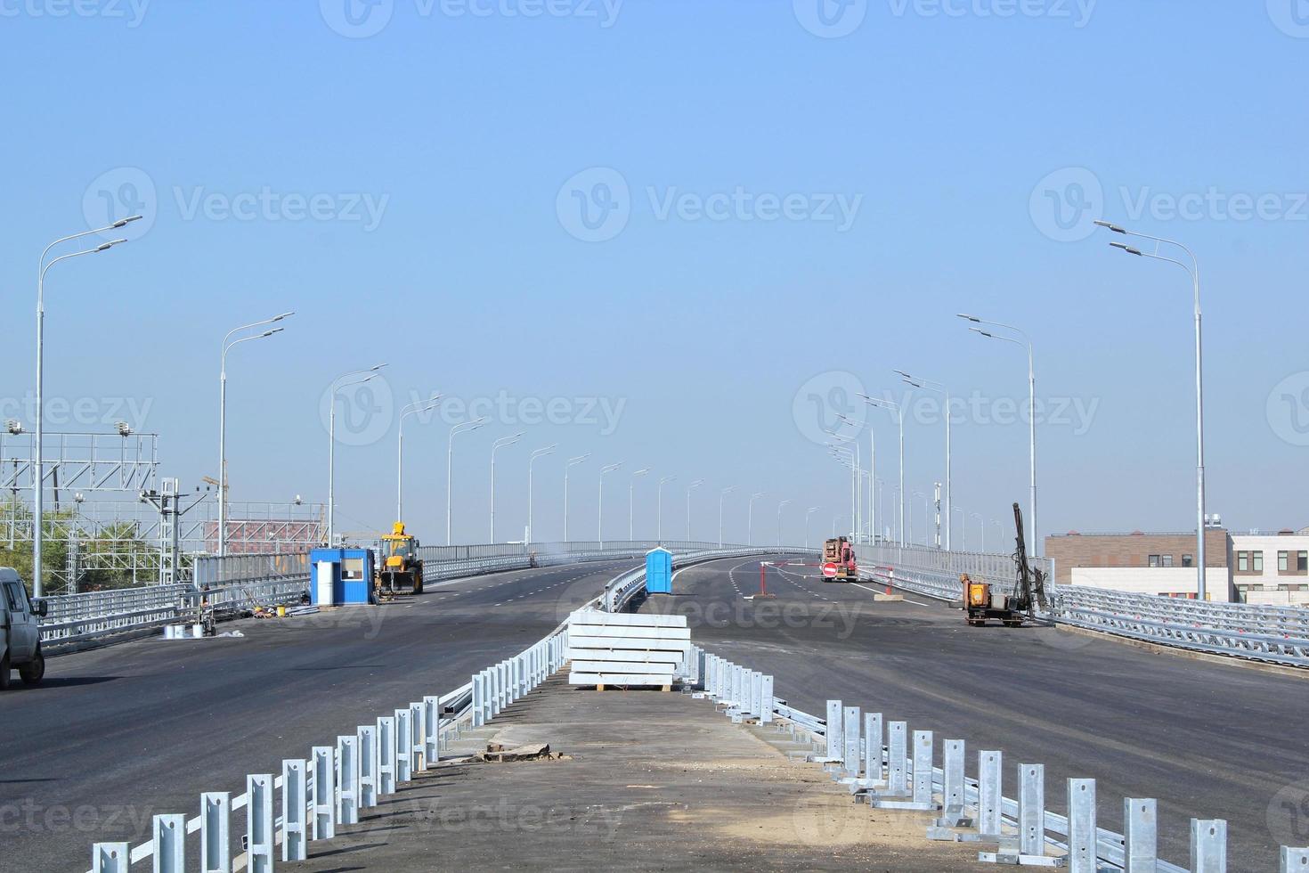 New traffic intersection road construction site. Development of transport infrastructure junction, improvement highway. Overpopulation problem. Erection overpass of northeast chord in Moscow, Russia photo