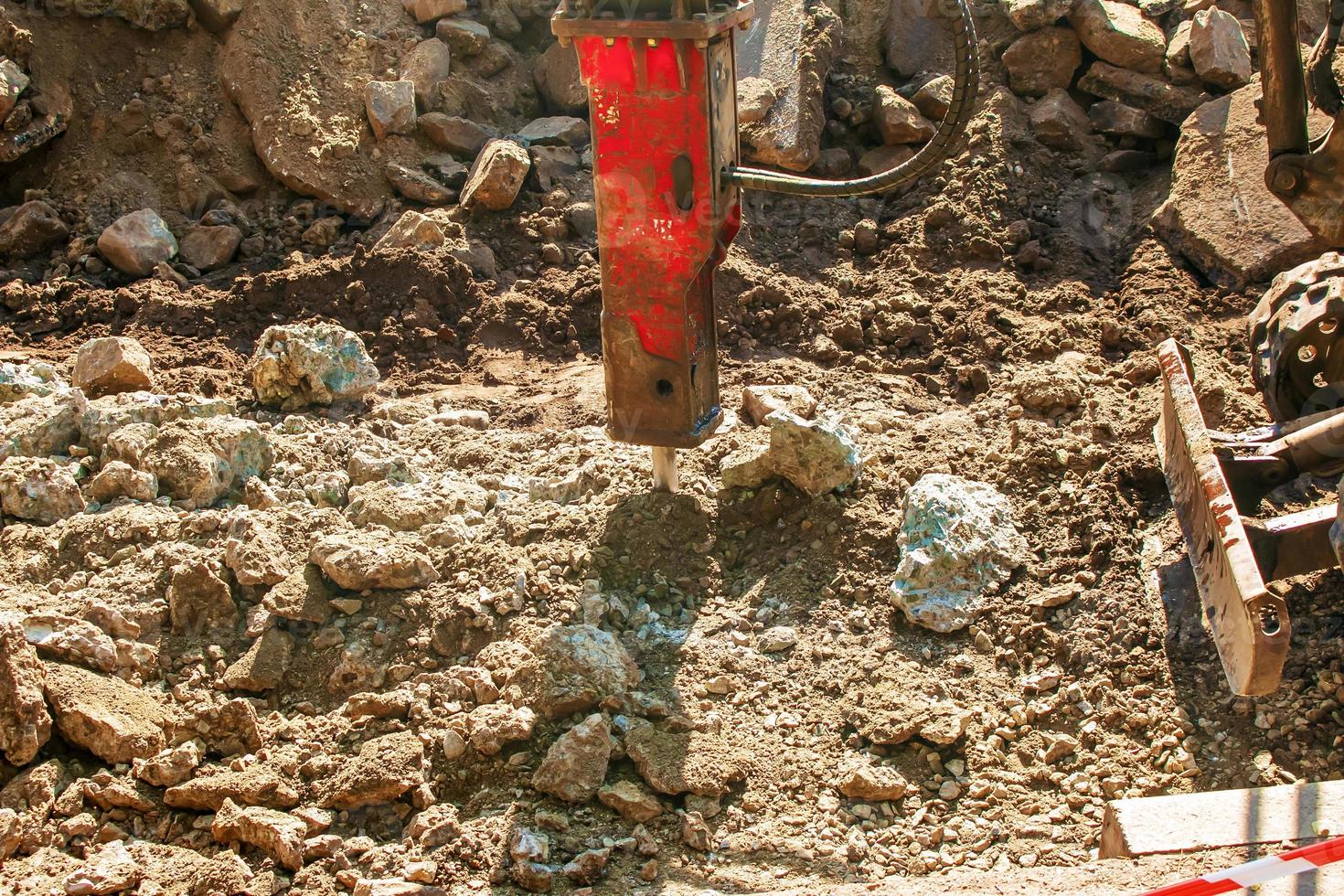 A jackhammer is working, a close-up of a drilling equipment builder. photo