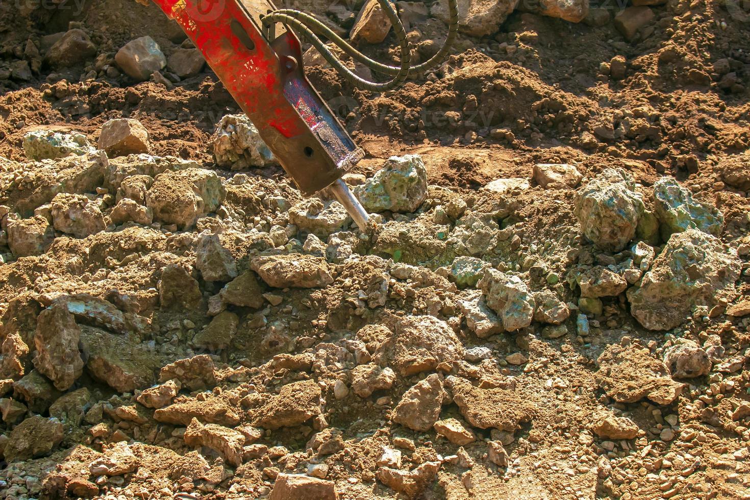 A jackhammer is working, a close-up of a drilling equipment builder. photo
