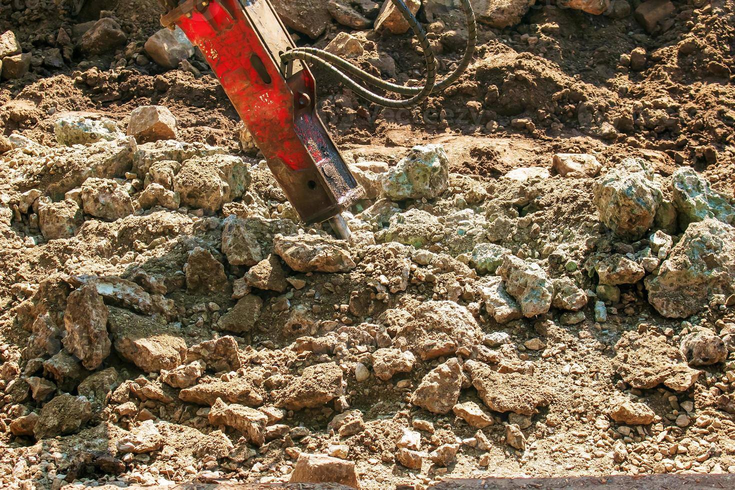 A jackhammer is working, a close-up of a drilling equipment builder. photo