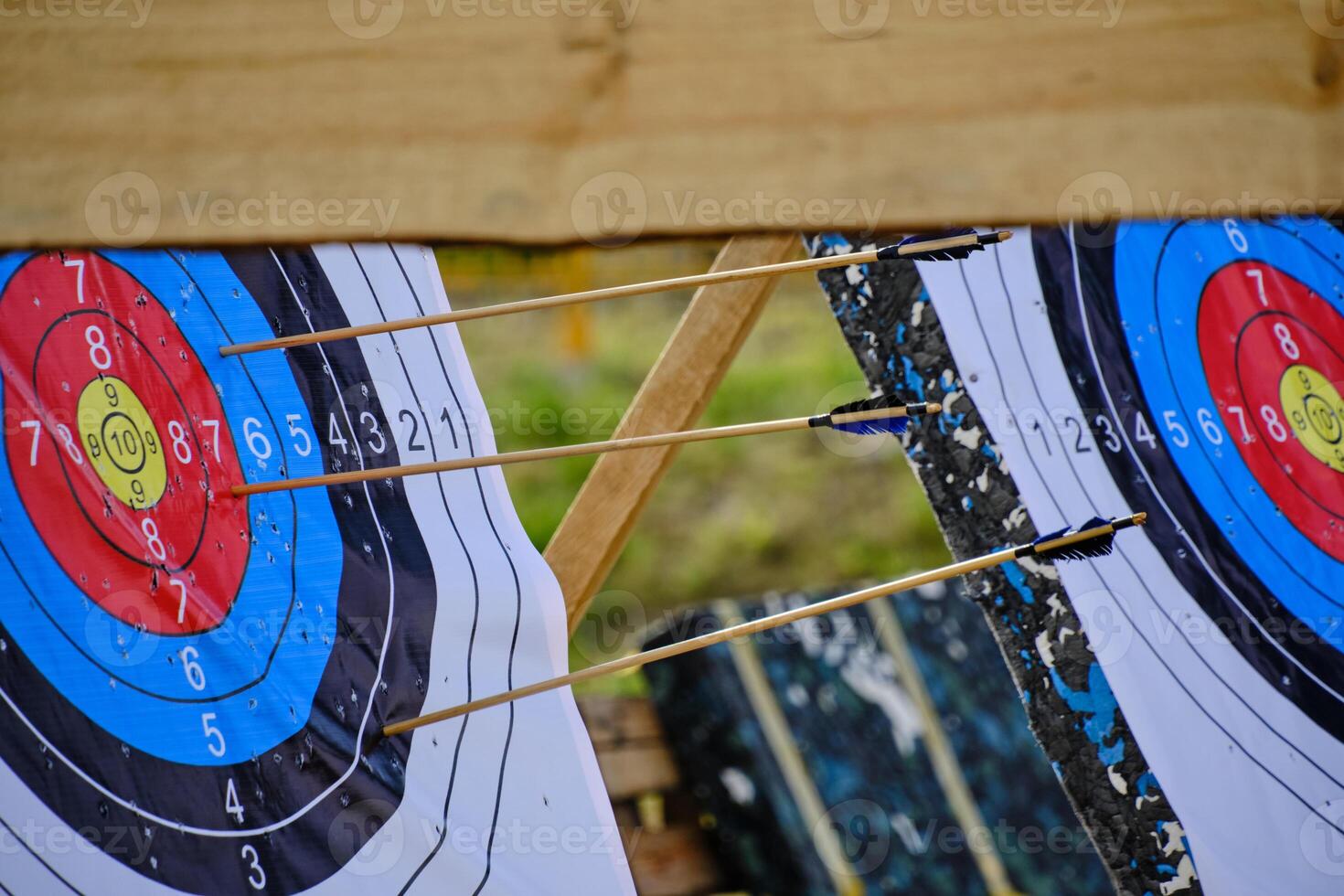 archery-targets-with-arrows-stuck-in-13295656-stock-photo-at-vecteezy