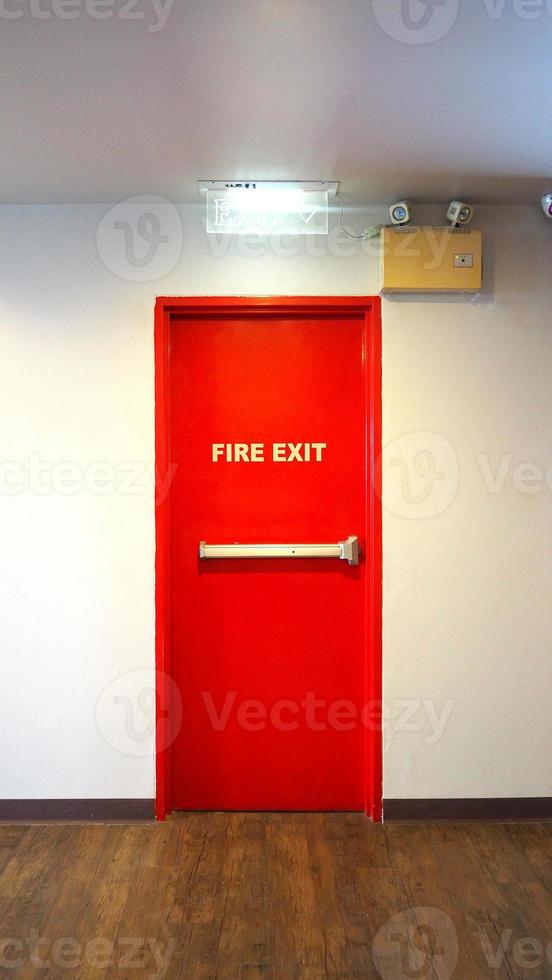 Emergency fire exit door. Red Color metal material. photo