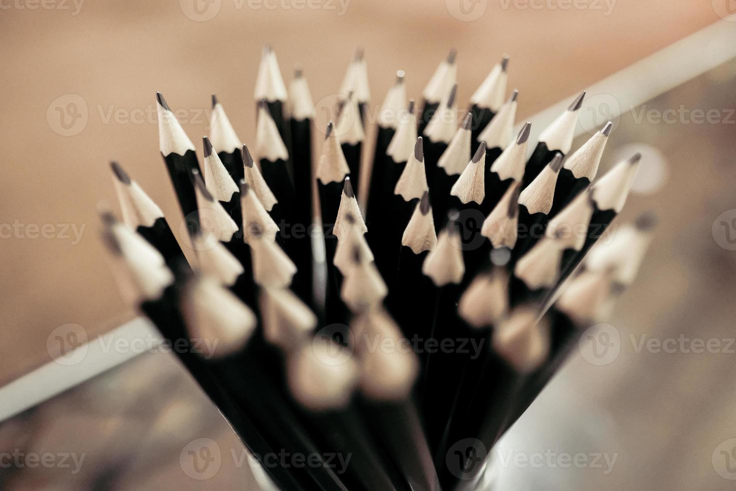 Close-up view of pencils in a conference hall photo