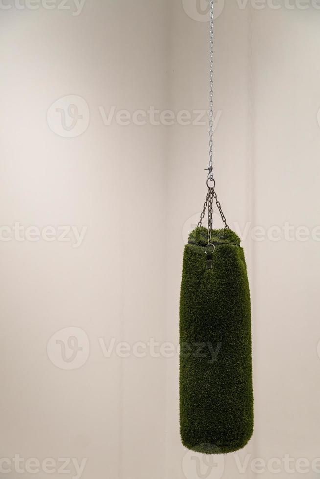 sack or boxing bag, lined with synthetic grass, hung with a chain, box sport, mexico photo