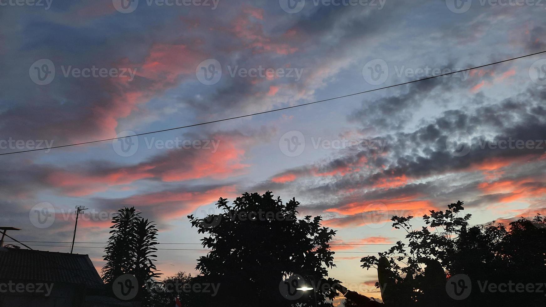 Evening sky background with pink clouds 02 photo