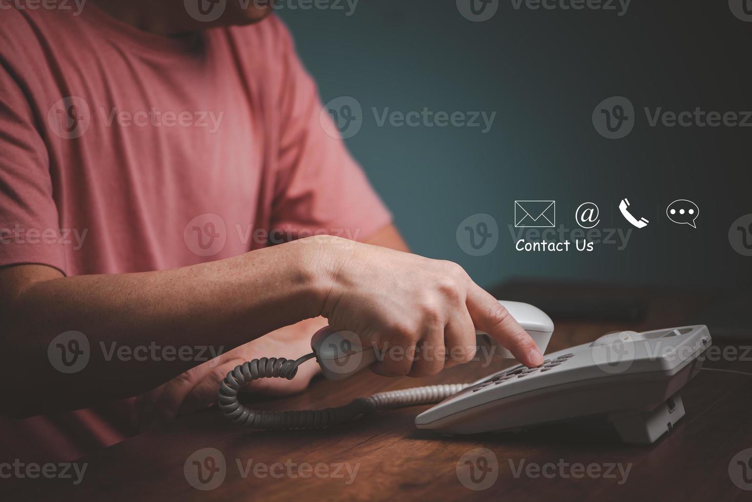 Communication contact us customer service,Telephone on the operator desk service center with message, phone, e mail, address icons, copy space. photo