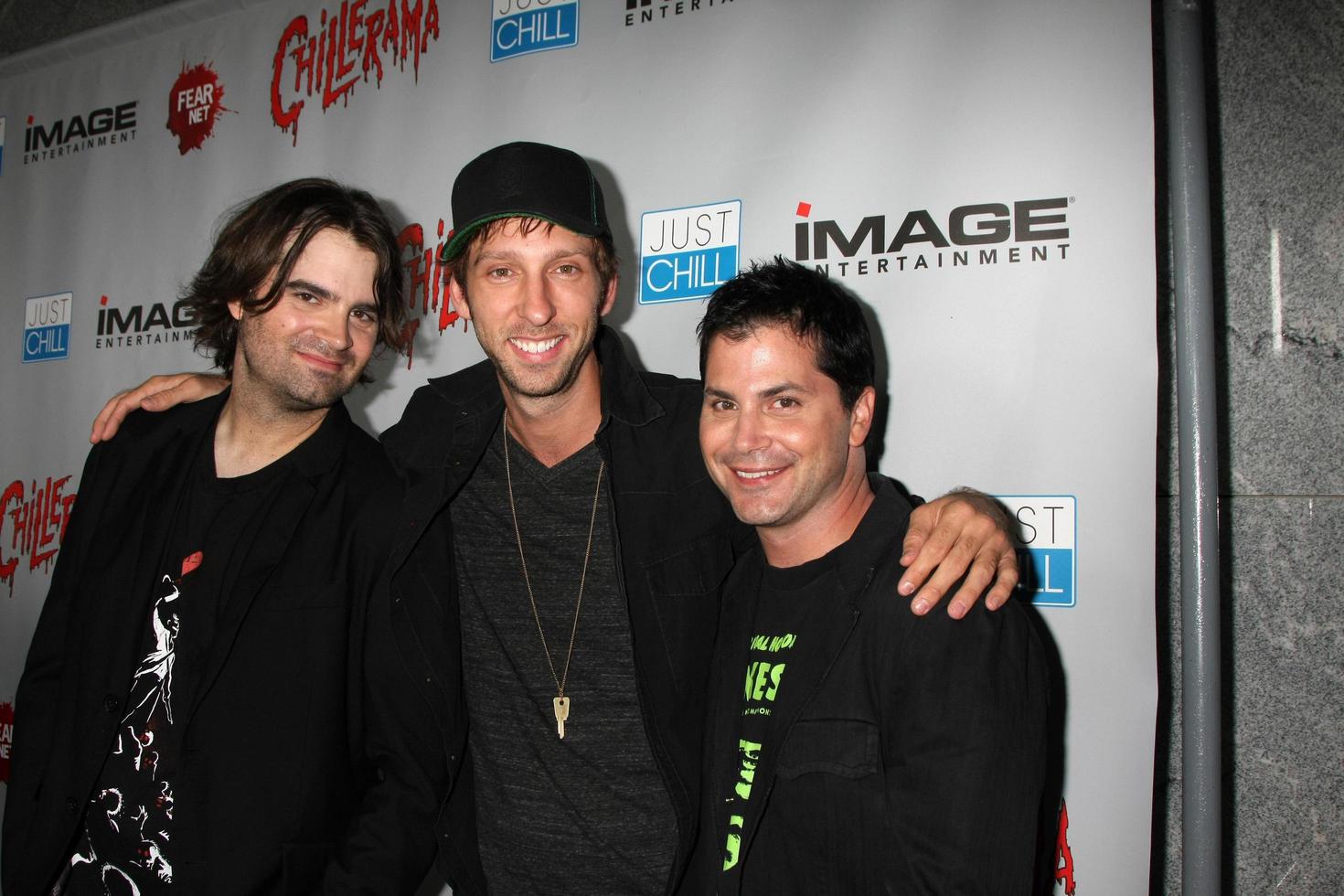 LOS ANGELES, SEP 15 - Joe Lynch, Joel David Moore, Adam Green arrives at the Chillerama Premiere at Hollywood Forever Cemetary on September 15, 2011 in Los Angeles, CA photo