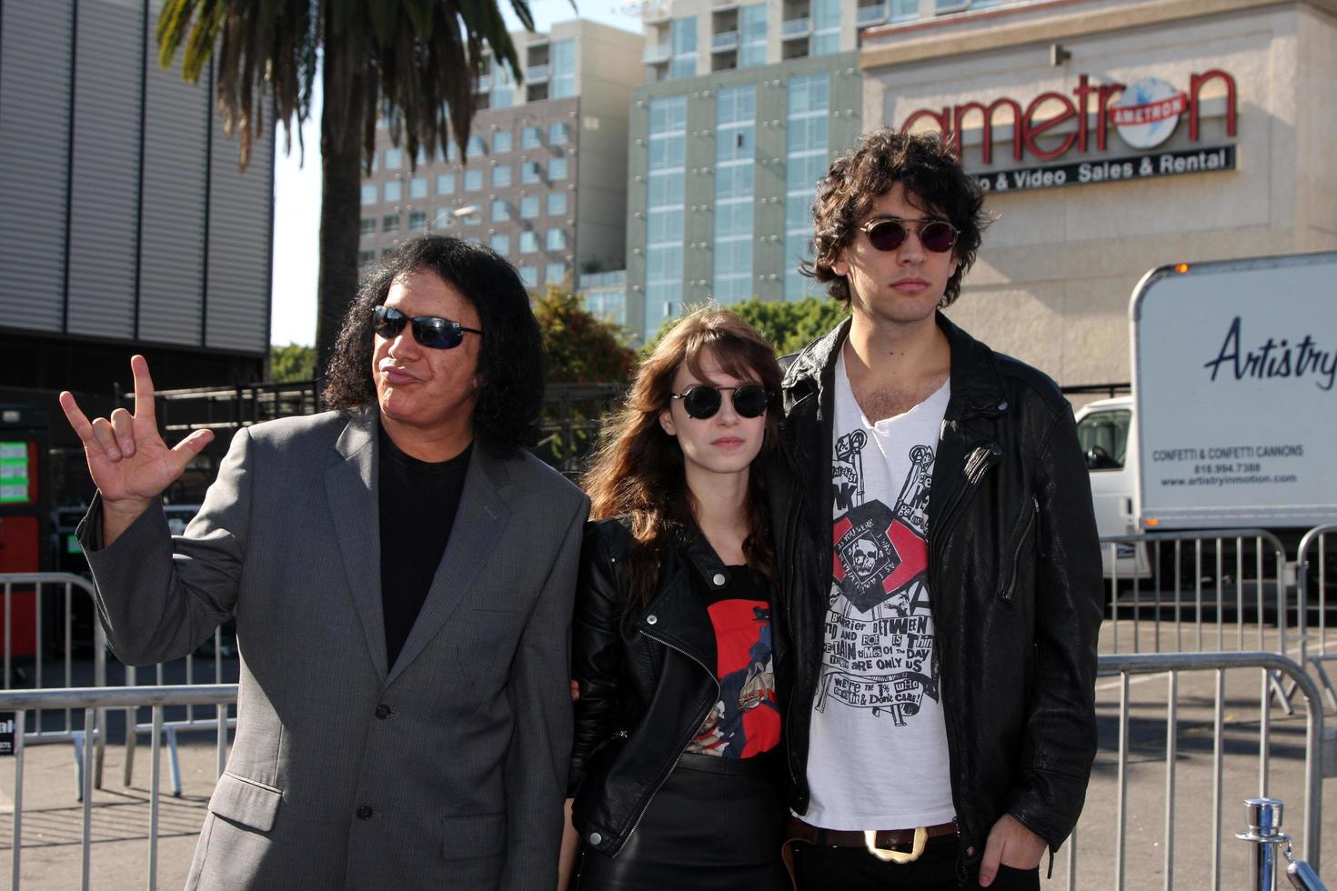 LOS ANGELES, AUG 14 - Gene Simmons Alex Esso Nick Simmons arriving at the 2011 VH1 Do Something Awards at Hollywood Palladium on August 14, 2011 in Los Angeles, CA photo