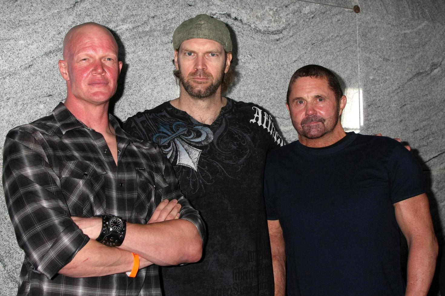 LOS ANGELES, SEP 15 - Derek Mears, Tyler Mane, Kane Hodder arrives at the Chillerama Premiere at Hollywood Forever Cemetary on September 15, 2011 in Los Angeles, CA photo