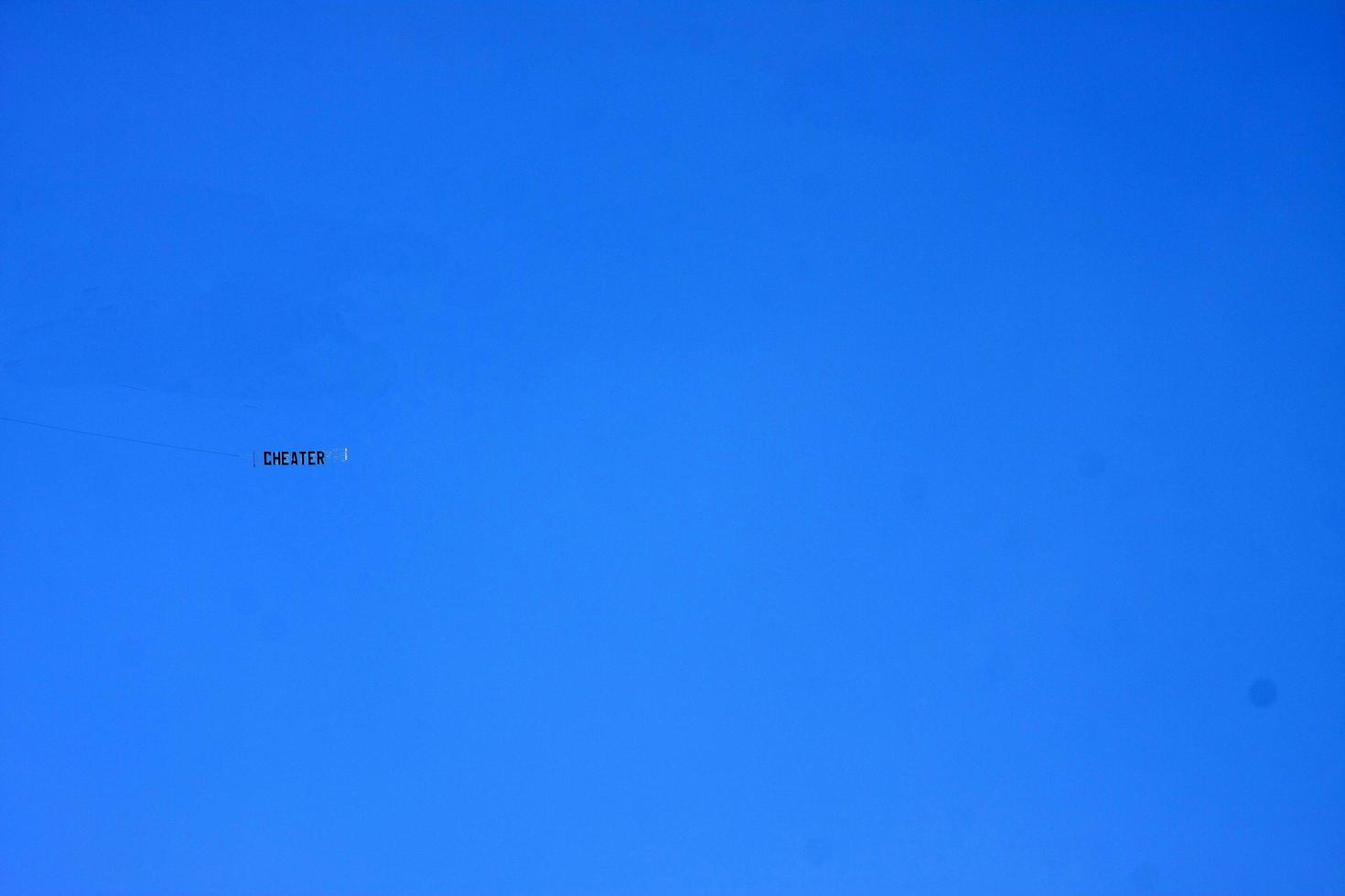 LOS ANGELES, JUN 2 - Plane with CHEATER sign at the Bobby Flay Hollywood Walk of Fame Ceremony at the Hollywood Blvd on June 2, 2015 in Los Angeles, CA photo