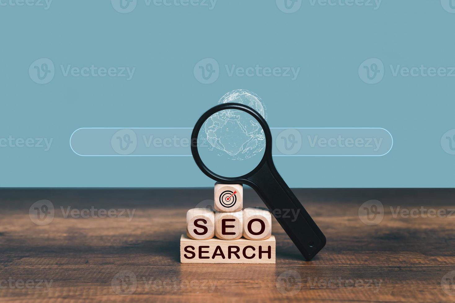 Magnifier glass for focus on Global business objective, isolated background and copy space. Search SEO, goal, target, strategy concept. photo