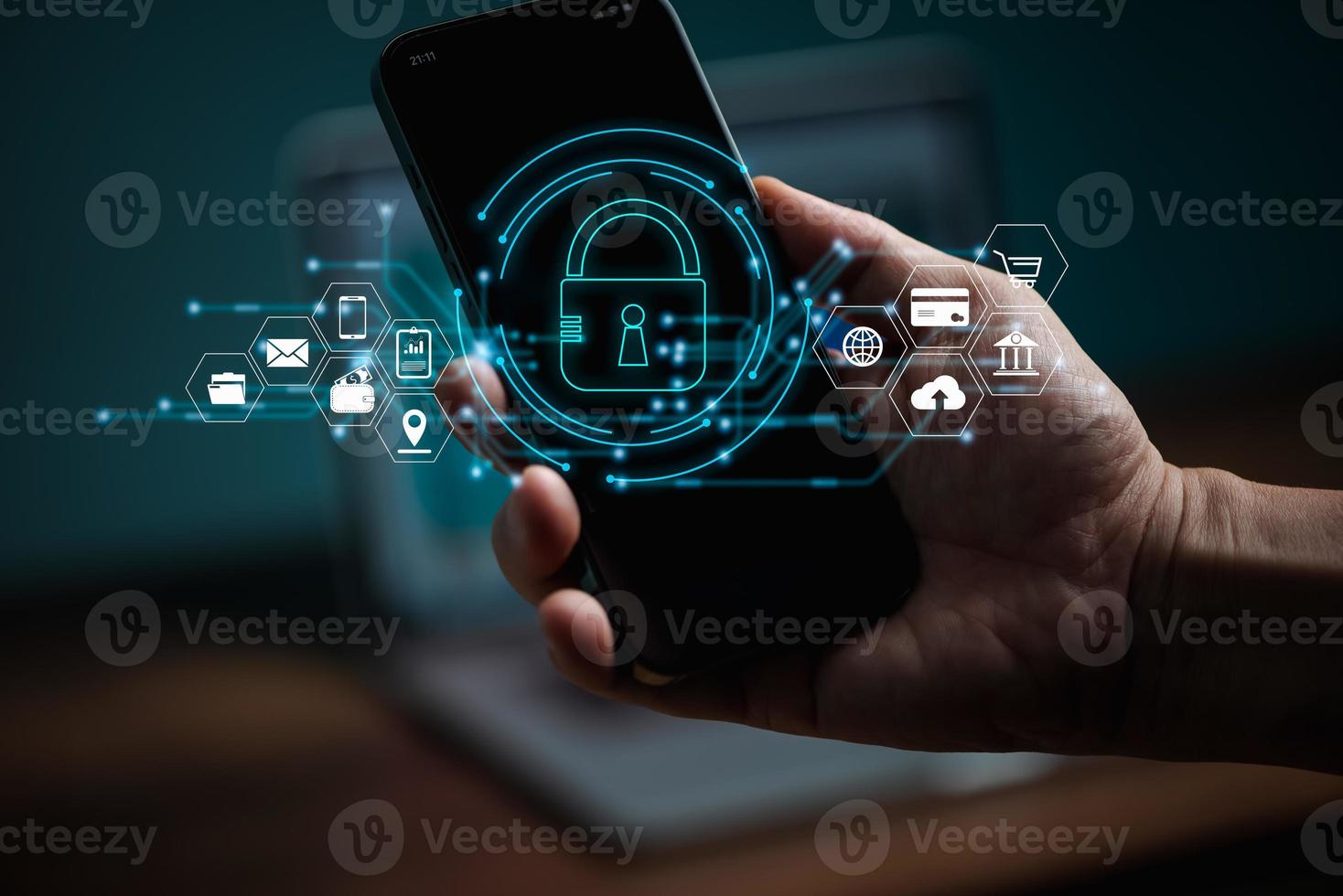 Cybersecurity and privacy concepts to protect data. Lock icon and internet network security technology. Businessman protecting personal data on smart phone with virtual screen interfaces. photo