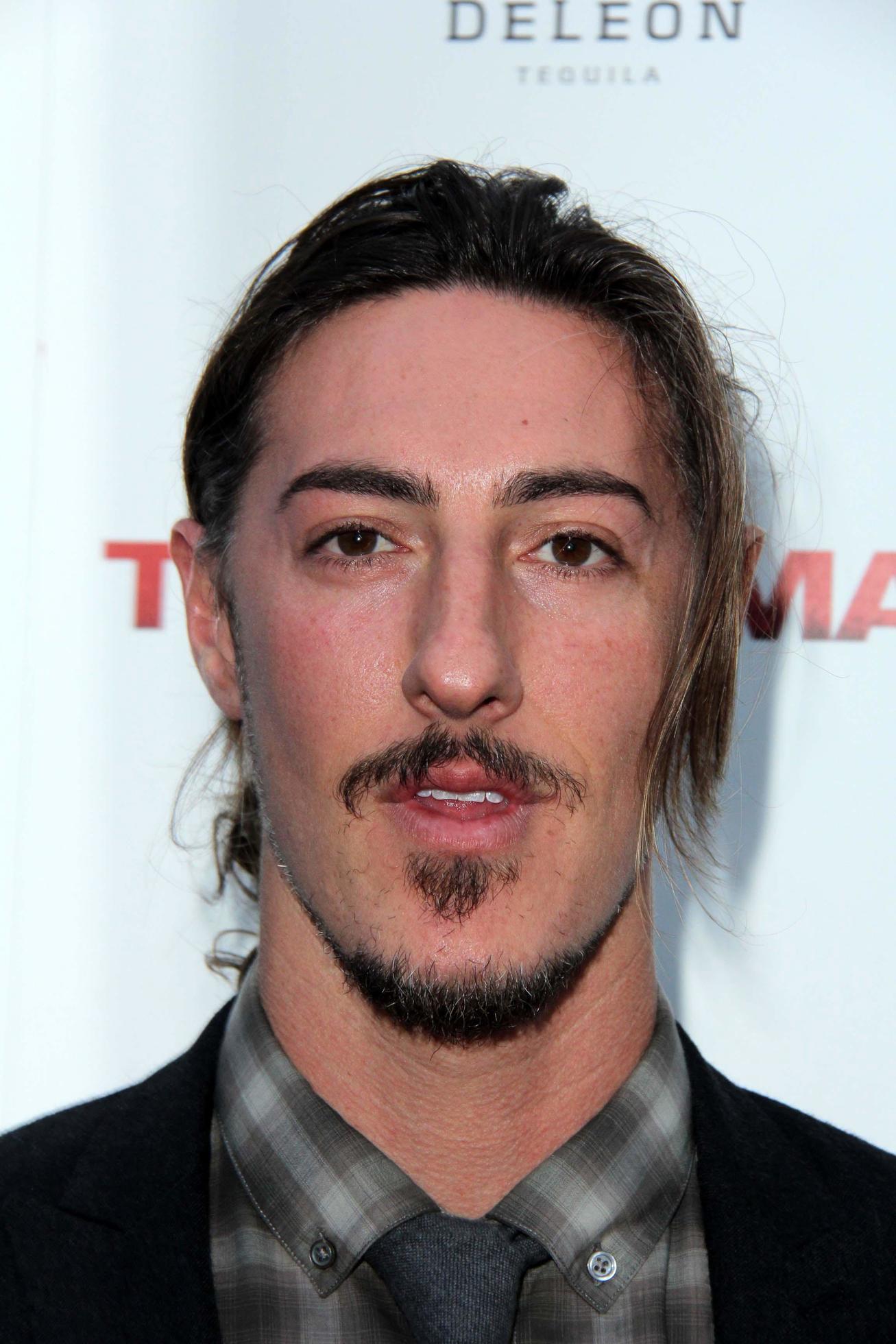 LOS ANGELES, APR 22 - Eric Balfour arrives at The Iceman Premiere at