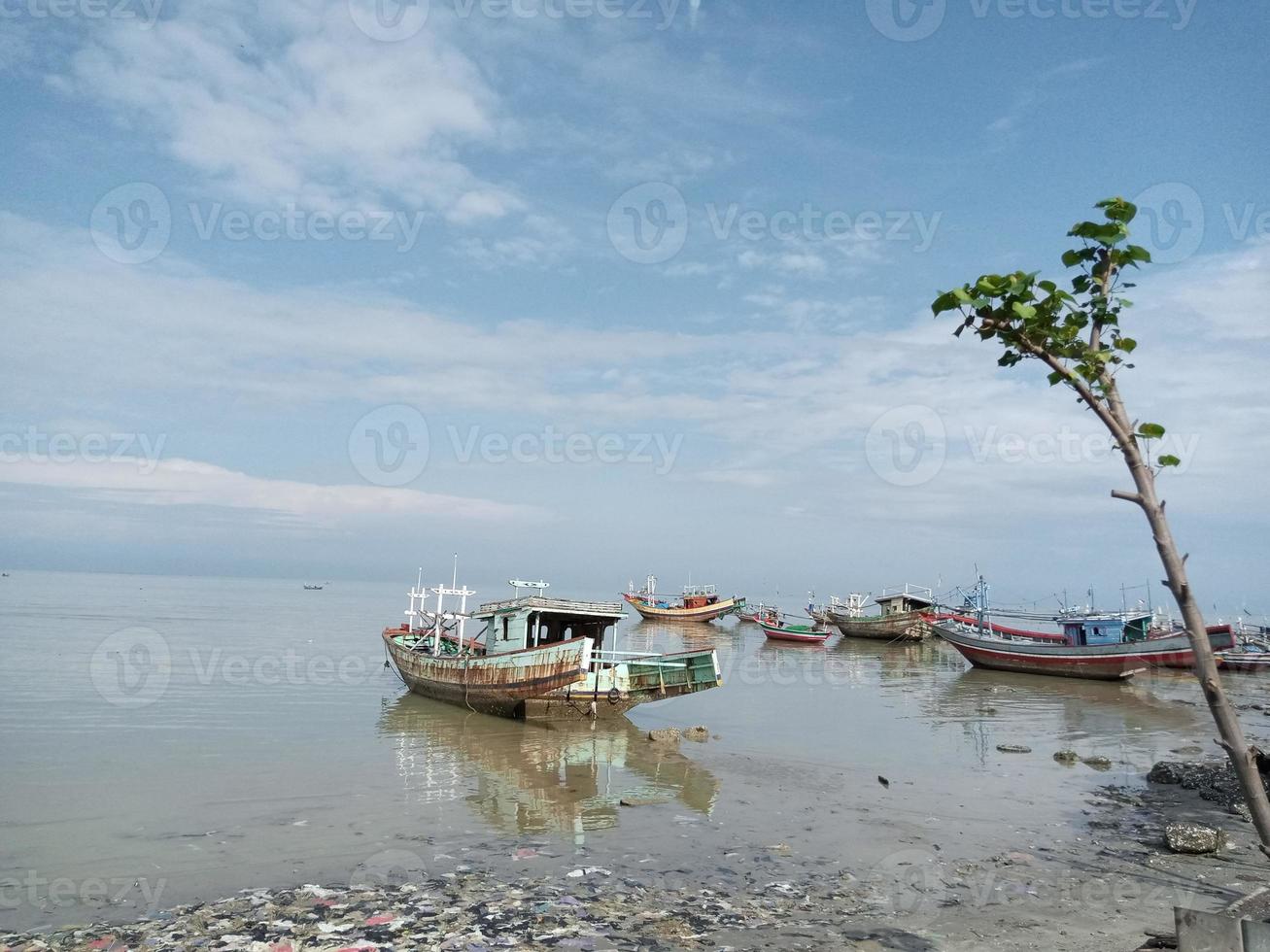 photo of boat on the beach